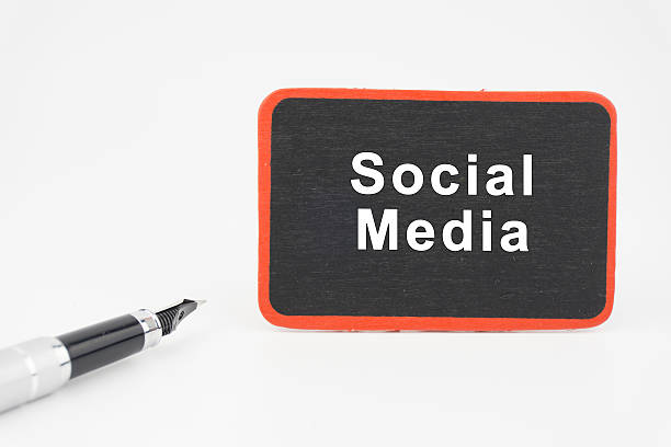 istock Social Media on mini blackboard  with pen over white background 516330832