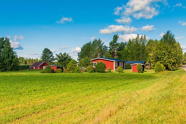 istock red houses in a rural landscape 516335299