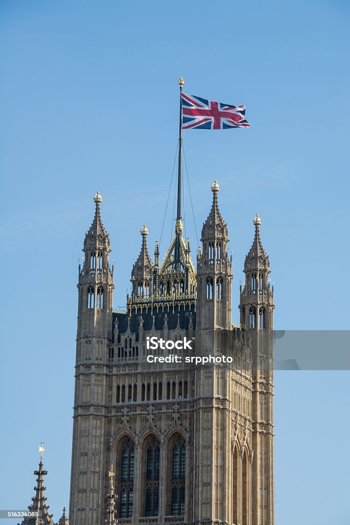 house of parliament House of parliament building with british flag and blue sky Big Ben Stock Photo
