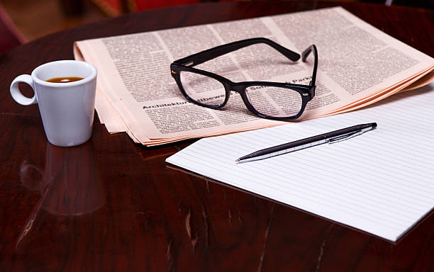 istock Cup of Coffee and Newspaper 516337055