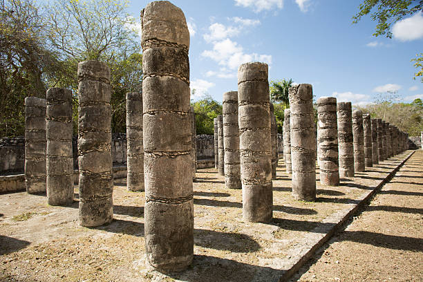 ancient round columns ancient round stone column rows on Mayan archaelogical site of Chichen Itza, Yucatan, Mexico archaelogy stock pictures, royalty-free photos & images