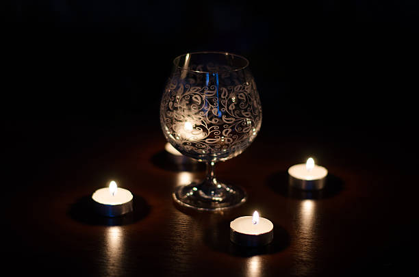 istock composition of the wine glasses and burning candles 516338627