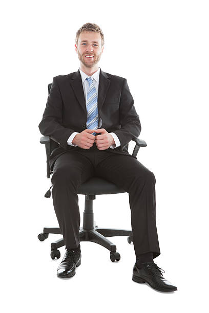 istock Confident Businessman Sitting On Office Chair 516339443