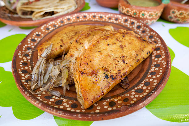 Mexican street food fried quesedilla stock photo