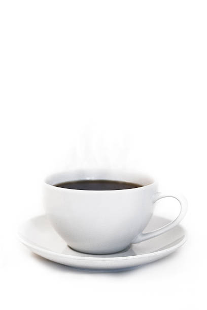 istock Black coffee with smoke in white cup on white background 516351821