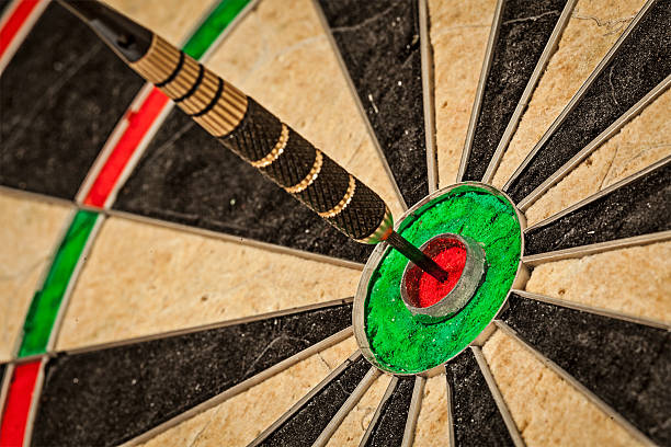 istock Dart in bull's eye close up 516353829