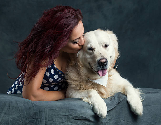 istock Woman with her dog 516356129