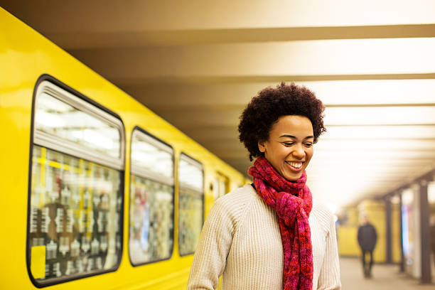 istock Young african woman at subway station 516357766