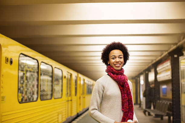 istock Attractive young woman at subway station 516357926