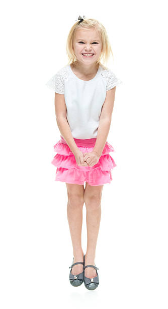 istock Cheerful little girl jumping 516357986