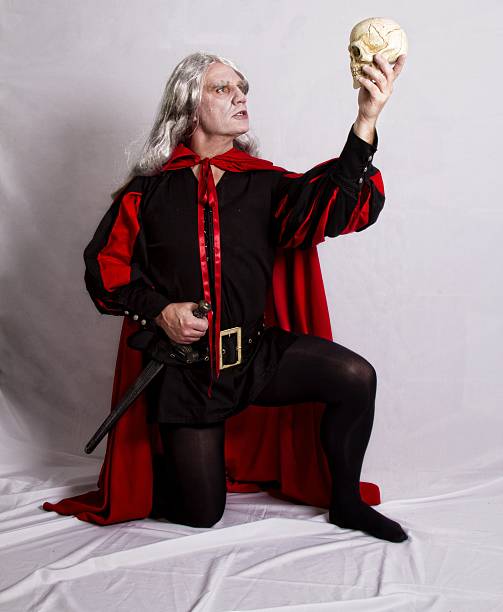 Mature man acting out Hamlet role