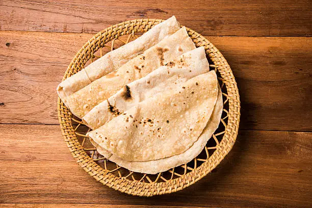 Bhendi masala or bhindi Masala, Ladies finger, Okra with roti / chapati / fulka / naan / indian bread / paratha