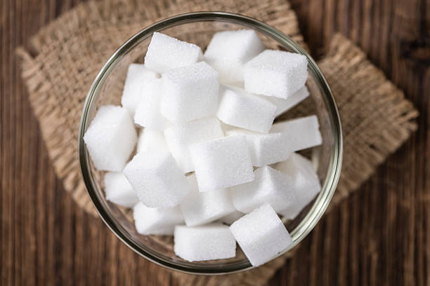 istock Portion of white Sugar in a bowl 516359844