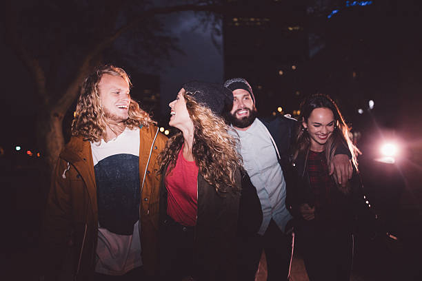 istock Hipster young friends hanging out in the evening 516360864