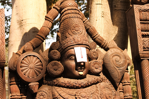 Sculpture of Balaji created through woodern carving
