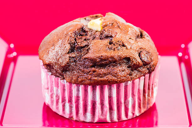 Closeup of a muffin on a red plate