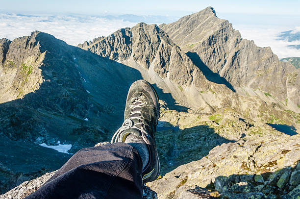 istock With a foot in the mountains 516374937