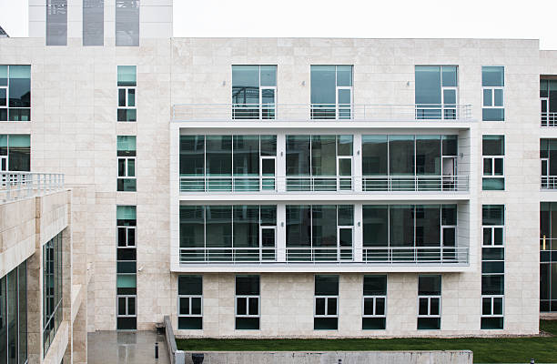 istock modern office building covered with glass 516375667
