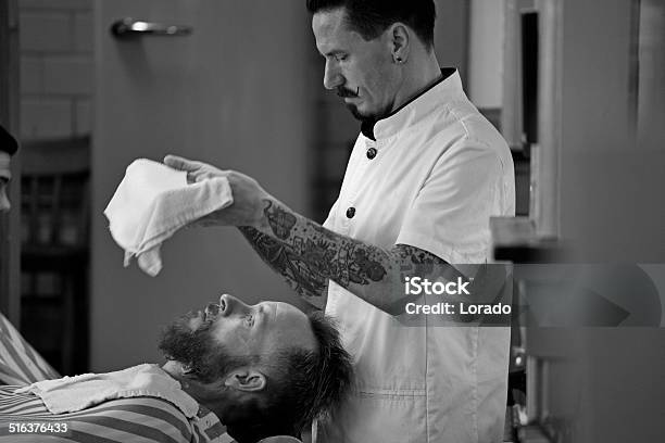 Moustached Barber Working On Client Stock Photo - Download Image Now - 2014, Adult, Barber