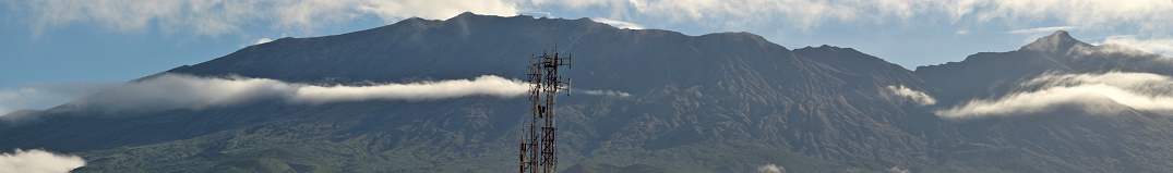 Cell phone tower interrupts the volcanic landscape of \
