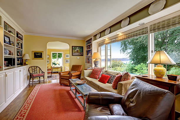 istock Living room with white storage and red rug 516378891