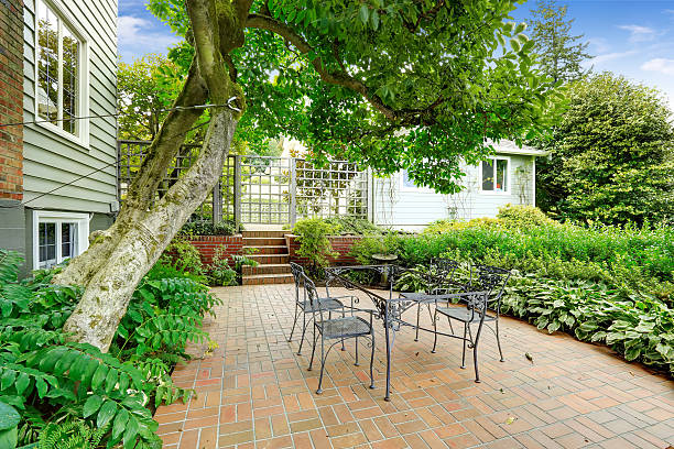 istock Antique iron table set on patio area with tile floor 516391425