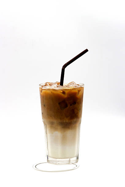 istock glass of ice coffee with straw 516391690