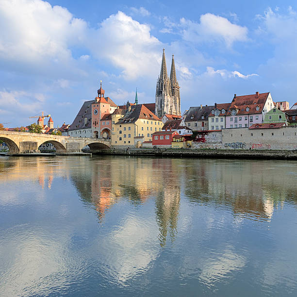 istock Regensburg Cathedral and Stone Bridge over Danube, Germany 516391779