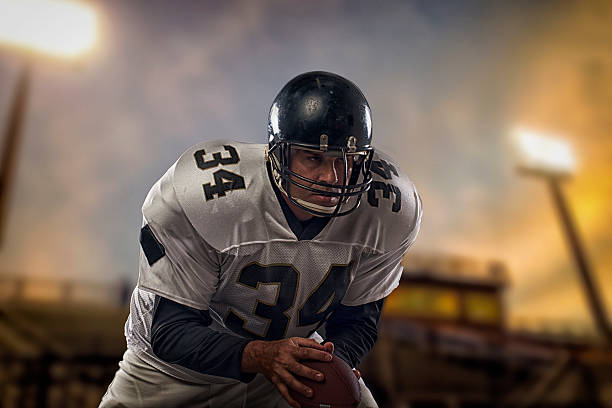 istock Football Player with the ball 516392523