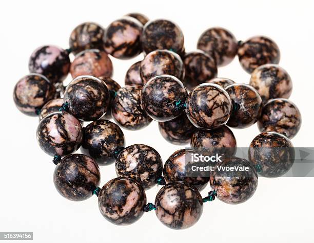 Tangled Necklace From Rhodonite Gemstone Beads Stock Photo - Download Image Now - Arts Culture and Entertainment, Bead, Black Color