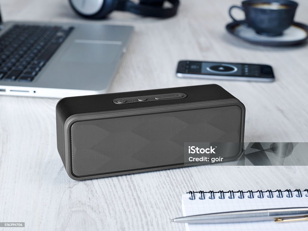 Wireless speaker Wireless speaker on a table Speaker Stock Photo