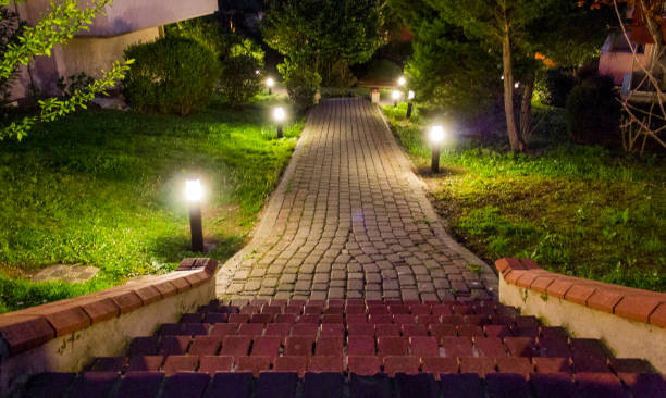 House and garden in city at midnight Houses and garden in the city at midnight. pedestrian walkway stock pictures, royalty-free photos & images