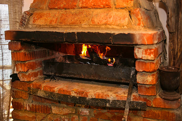 istock burning firewood in brick furnace 516395670