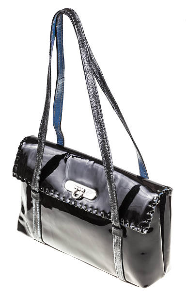 istock purse from black patent leather isolated on white 516395894