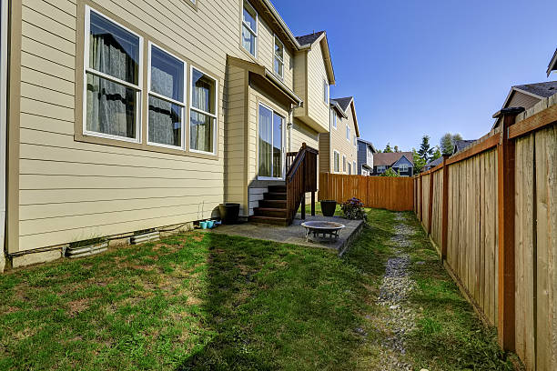 istock House with small backyard patio area 516396237