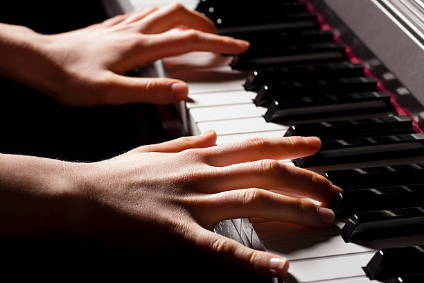 istock hand of a pianist 516396375