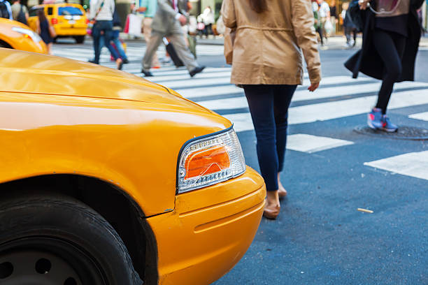 istock people crossing a street in NYC 516397102