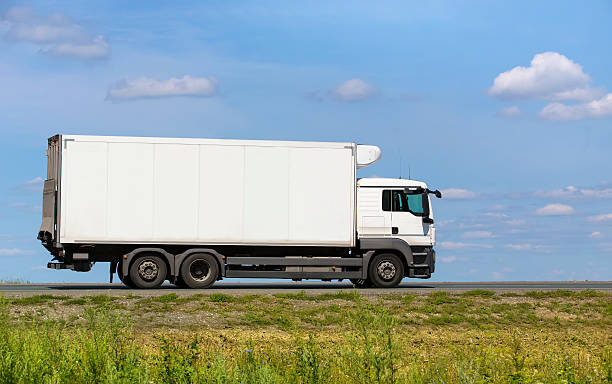 istock truck transports freight on highway 516397192