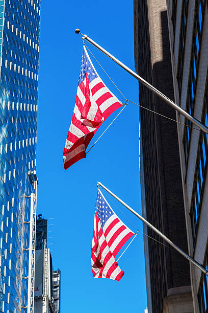 istock US flags at skyscrapers in New York City 516397704
