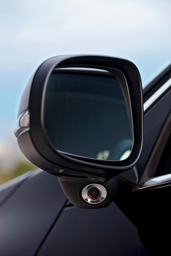 Modern car mirror with blind spot information system camera