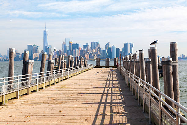istock pier at Liberty Island with view to Manhattan 516398278