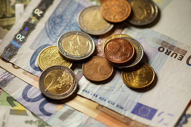 istock Euro coins and banknotes money. 516398443