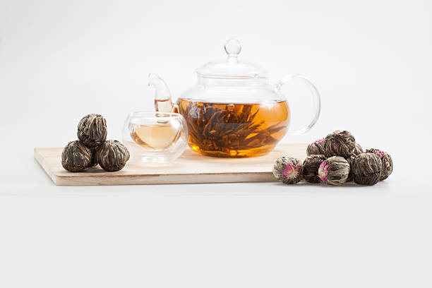 istock exotic green tea with flowers in glass teapot 516402768