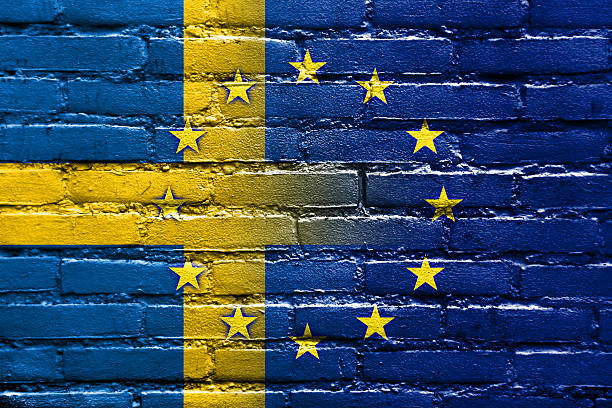 istock Sweden and European Union Flag painted on brick wall 516408419