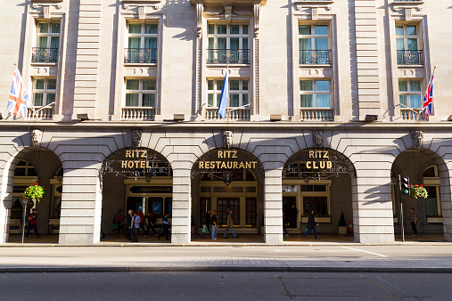 London, UK - September 26, 2014: The outside of the RITZ along Piccadilly during the day. People can be seen outside the building