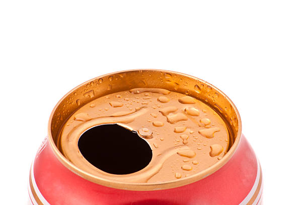 istock Red aluminum can closeup with water drops 516409387