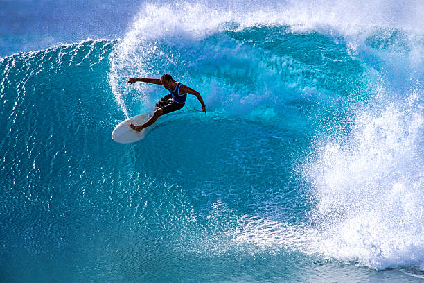 Maui, Hawaii, USA – December 2, 2001: Surfing at Honolua Bay on the north shore of Maui island with Michael Ho (USA), one of the best waves in the state of Hawaii.