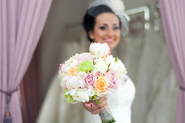 Happy Bride with bouquet stock photo