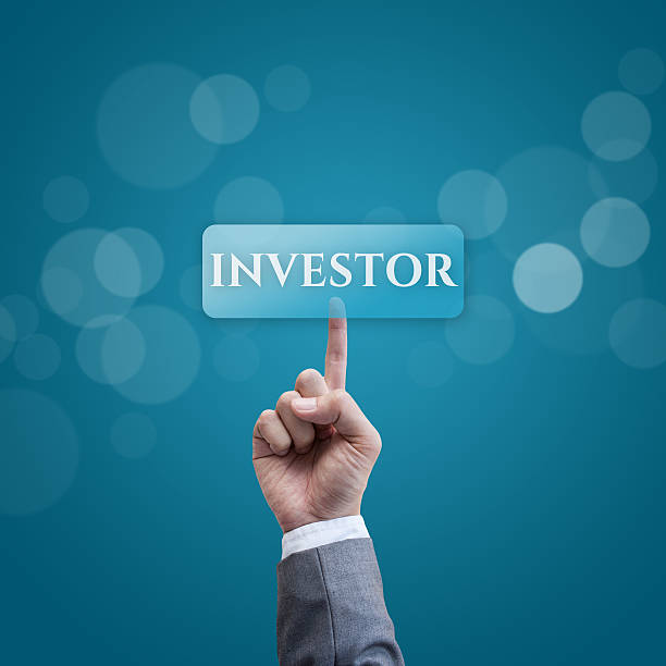 Investor business man press button stock photo