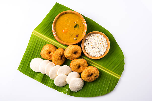 istock idli vada sambar on coconut leaf, south indian food 516414098